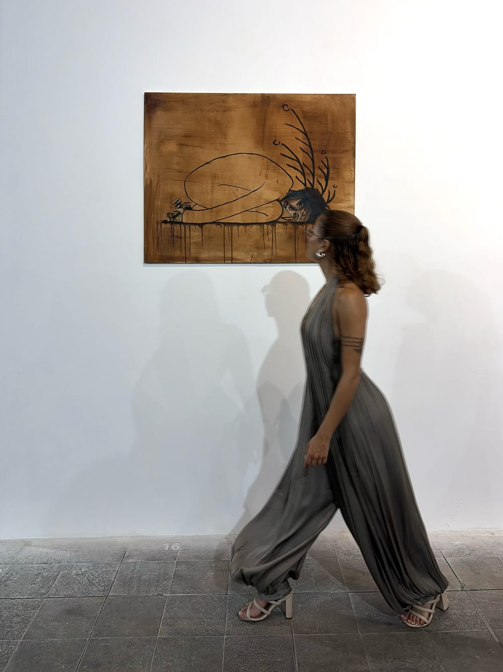 Valeria walking past Valerian Root at The Bomb Factory.