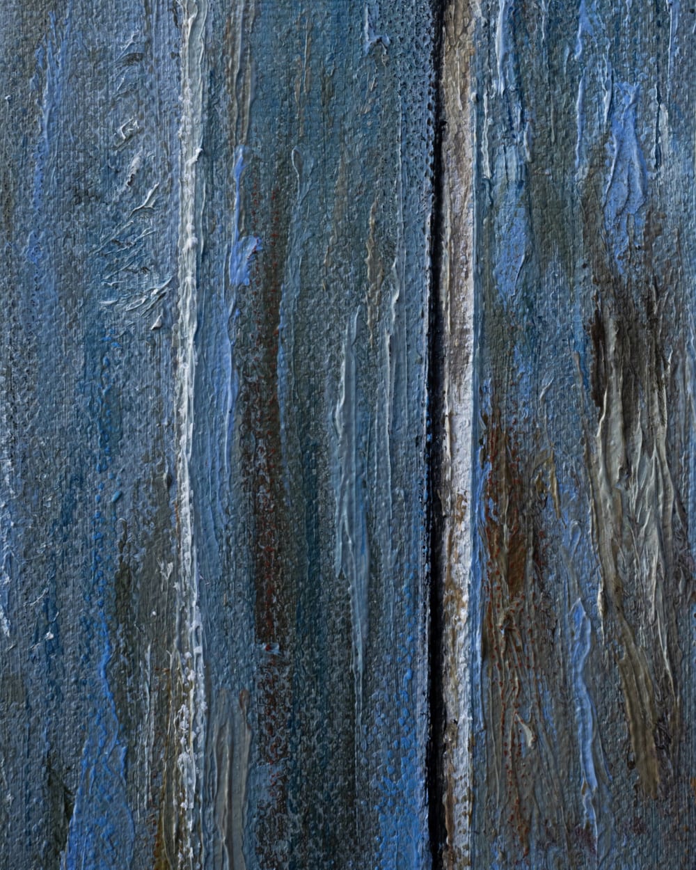Detail of Inocencia: weathered blue boards.