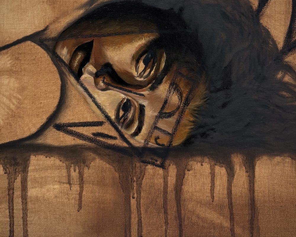 Detail of Valerian Root: the face, eyes half closed.